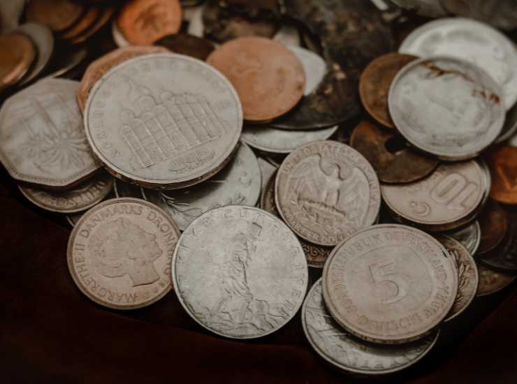 Moneta lire con San Michele - Giornalepop.it (Fonte foto Canva)
